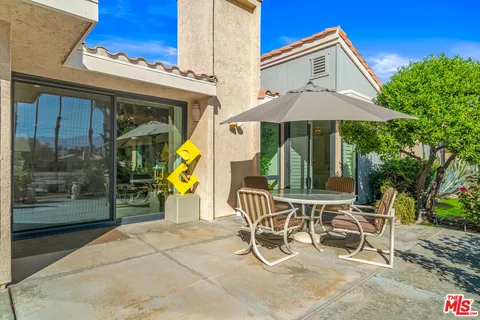 a view of a back yard of the house