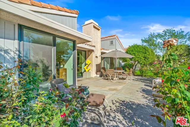 a house view with a garden space