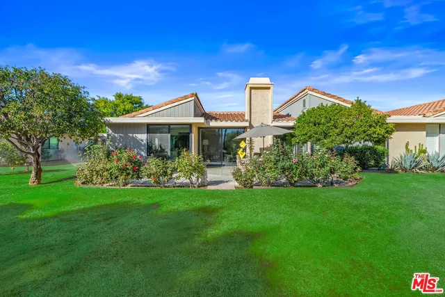 a living room with furniture or couch and a fireplace