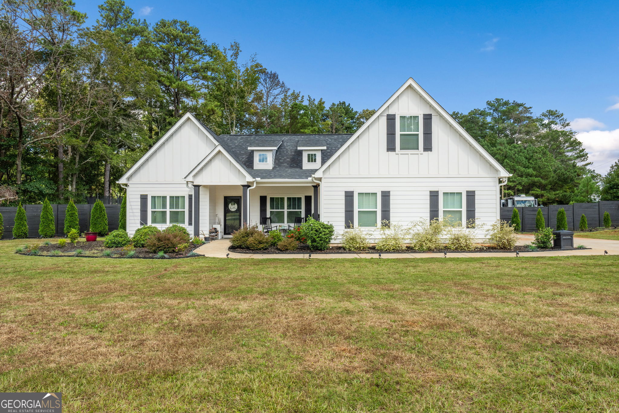 56 Bottoms Road Williamson, GA 30292 - Photo 1 of 1 a front view of a house with a yard