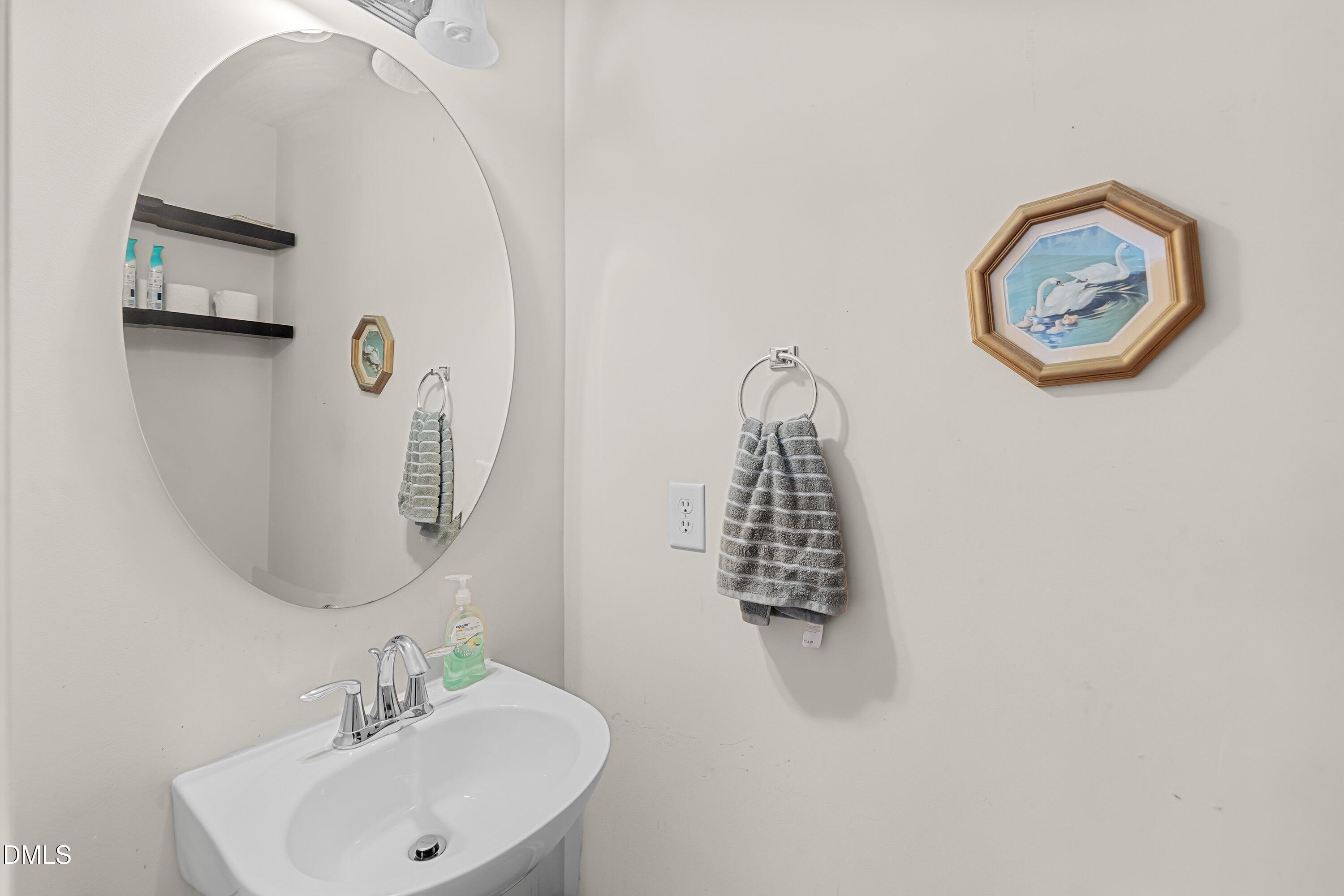 5335 Big Bass Drive Raleigh, NC 27610 - Photo 9 of 23 main level half bath