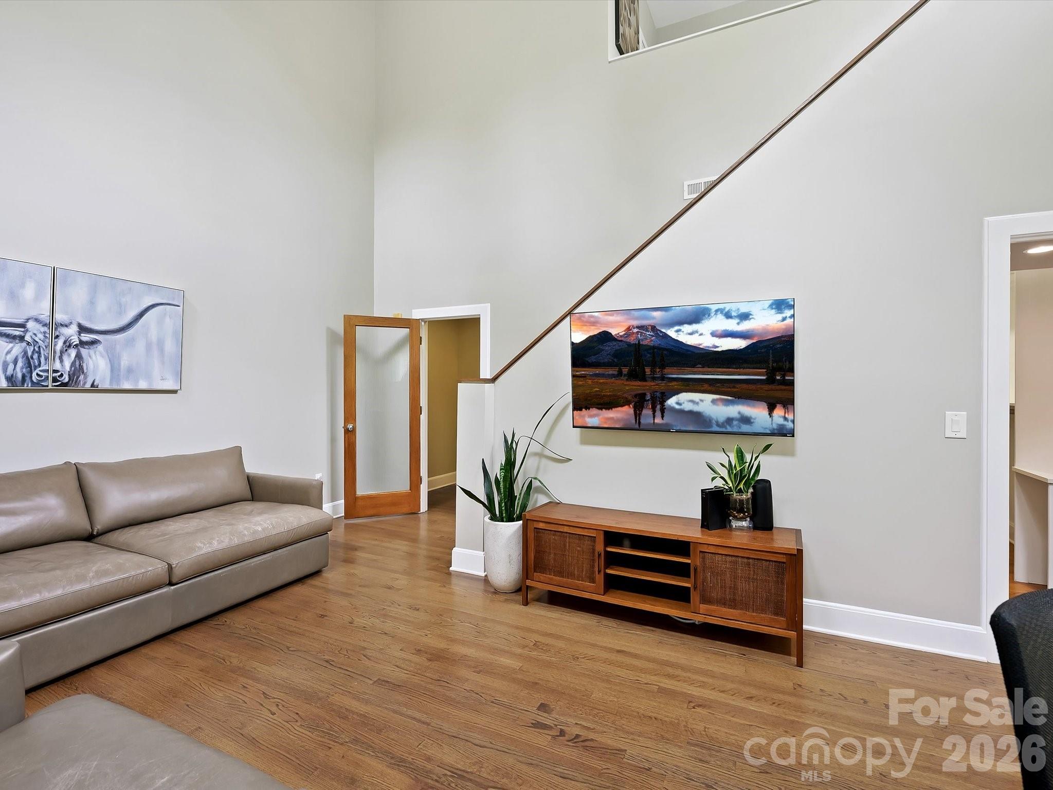 420 Queens Road Charlotte, NC 28207 - Photo 21 of 35 a living room with furniture and wooden floor