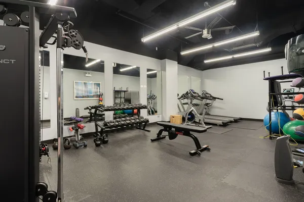a view of a room with gym equipment