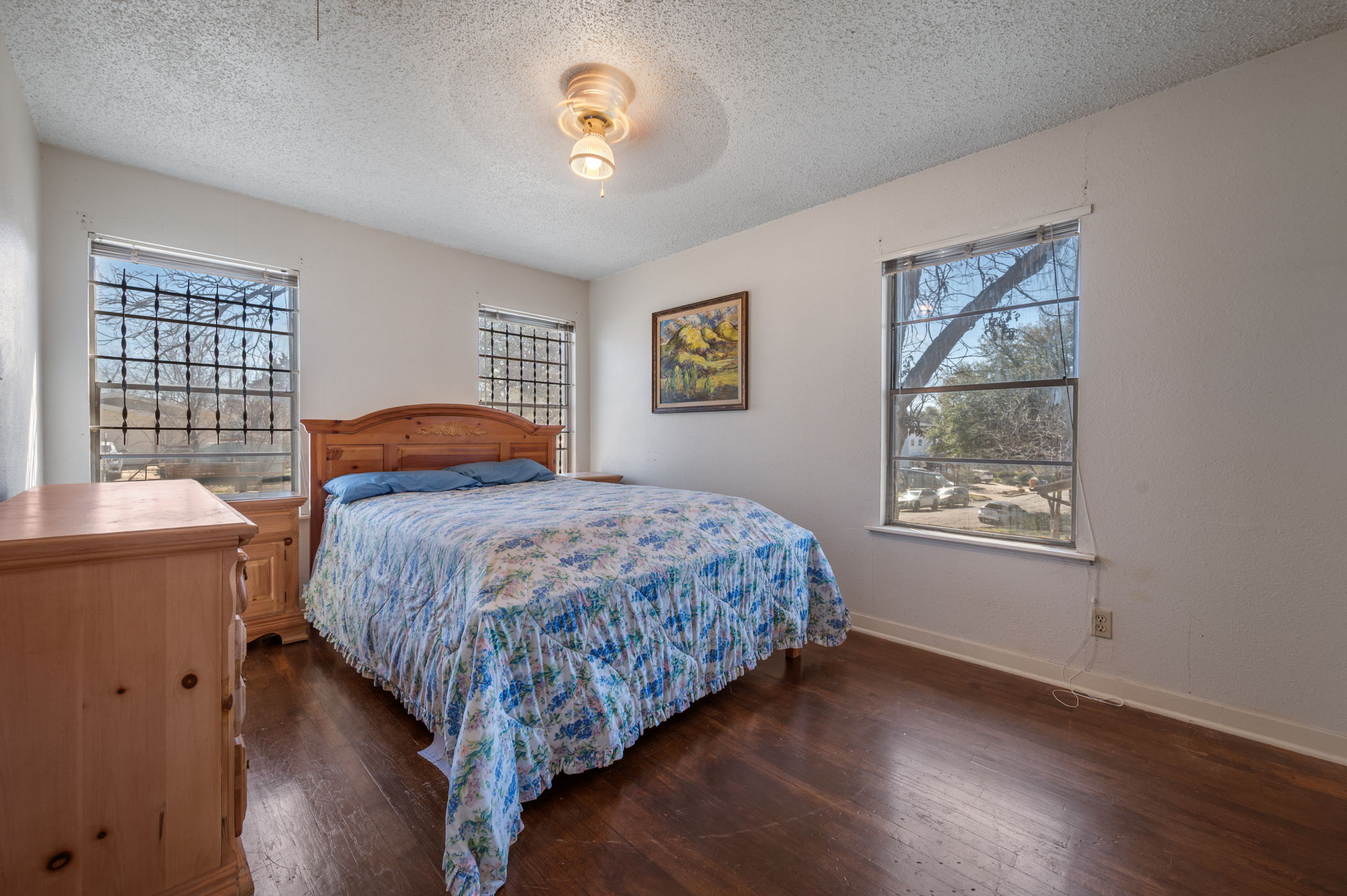 2000 Cedar Avenue Austin, TX 78722 - Photo 11 of 22 a bedroom with a bed and a window