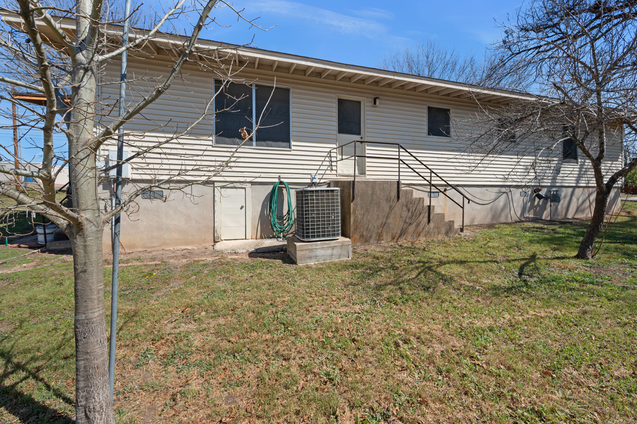 2000 Cedar Avenue Austin, TX 78722 - Photo 16 of 22 a view of a house with a yard
