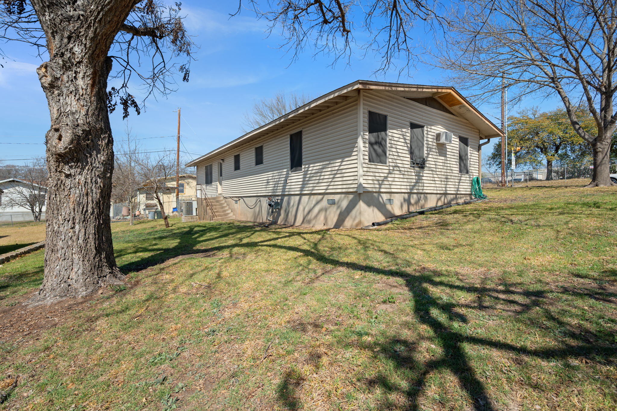 2000 Cedar Avenue Austin, TX 78722 - Photo 17 of 22 a front view of a house with yard