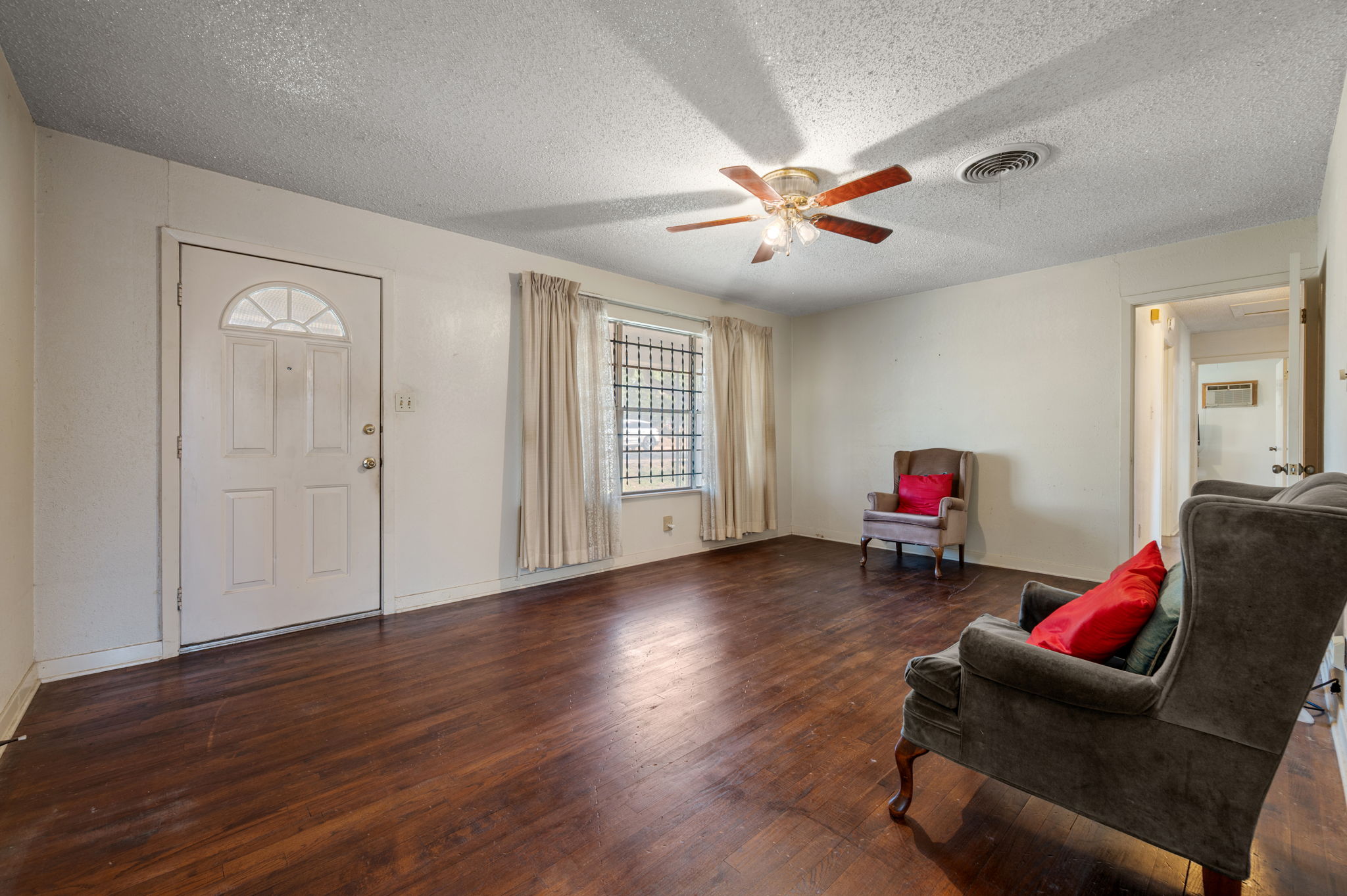 2000 Cedar Avenue Austin, TX 78722 - Photo 3 of 22 a living room with furniture and a large window