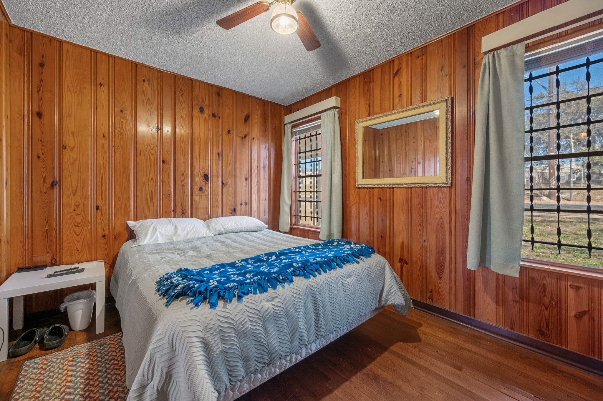 2000 Cedar Avenue Austin, TX 78722 - Photo 10 of 22 a bedroom with a bed and a window