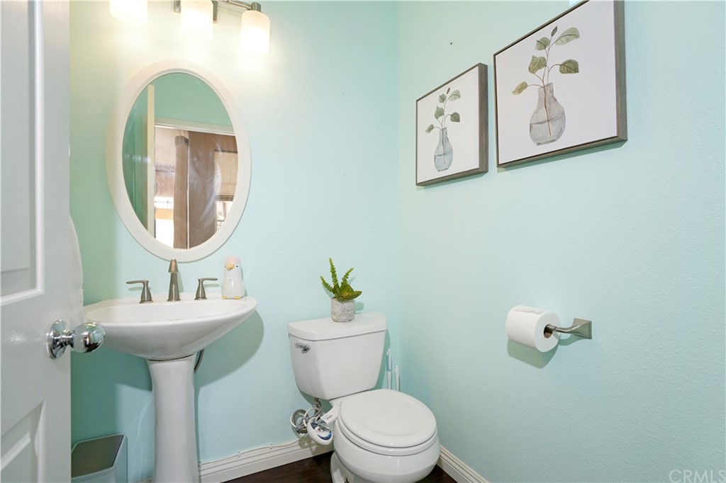 10 Westerly Aliso Viejo, CA 92656 - Photo 11 of 29 a bathroom with a toilet a sink and mirror