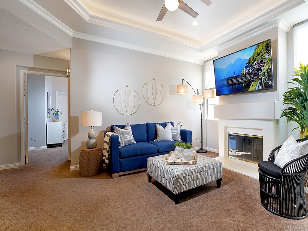 10 Westerly Aliso Viejo, CA 92656 - Photo 15 of 29 a living room with furniture and a fireplace