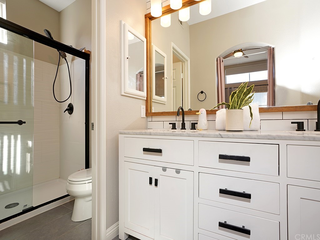 10 Westerly Aliso Viejo, CA 92656 - Photo 20 of 29 a bathroom with a double vanity sink mirror and toilet