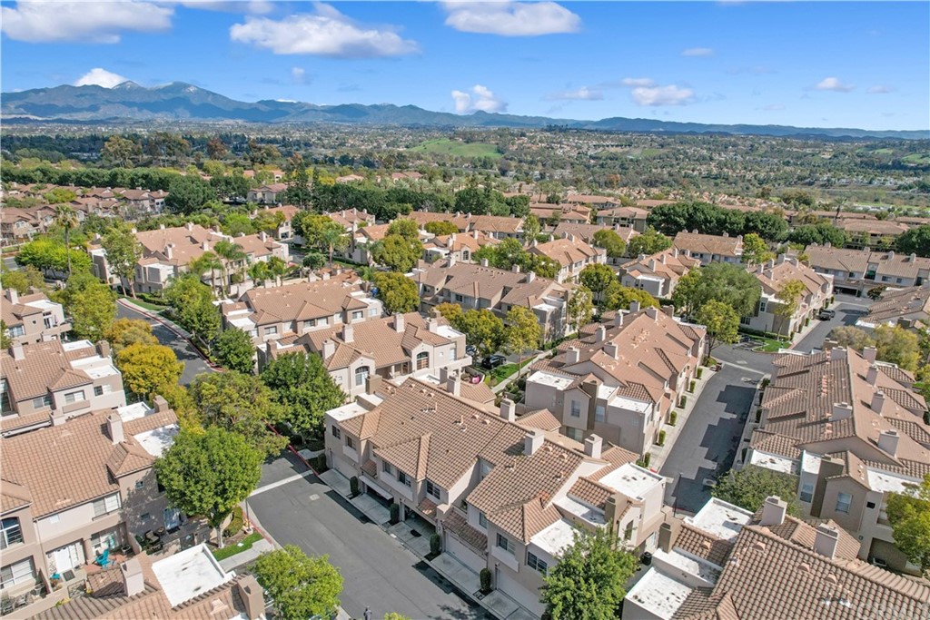 10 Westerly Aliso Viejo, CA 92656 - Photo 2 of 29 an aerial view of residential houses with outdoor space and ocean view