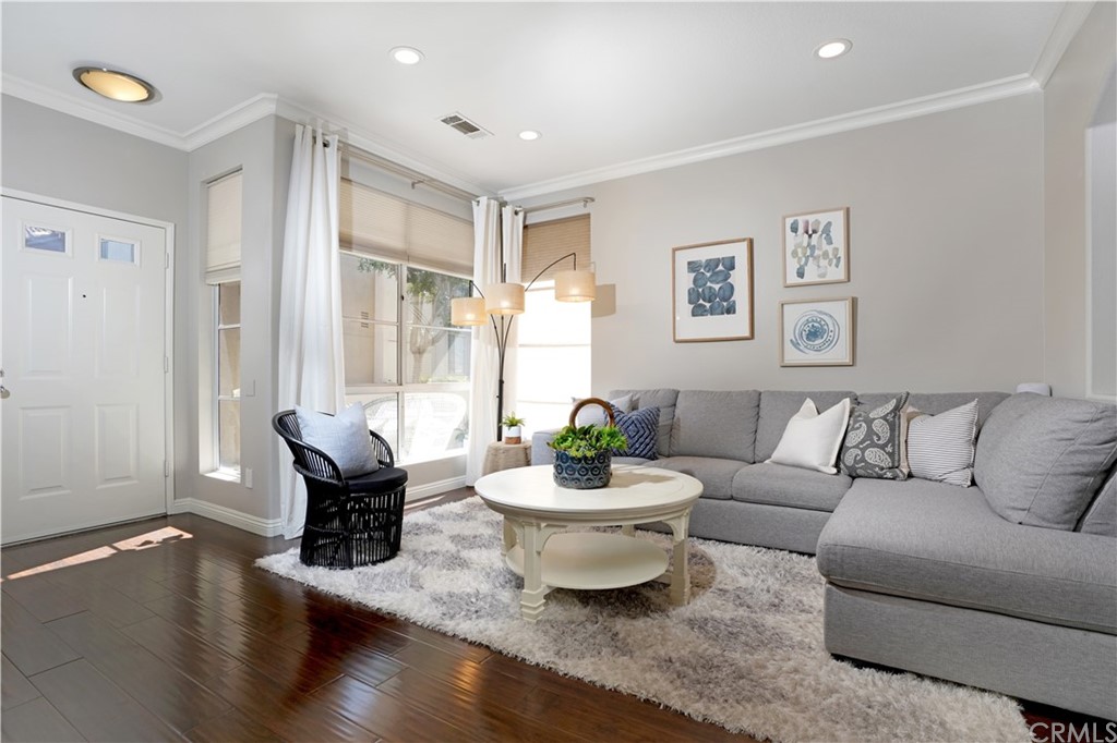 10 Westerly Aliso Viejo, CA 92656 - Photo 4 of 29 a living room with furniture and a potted plant