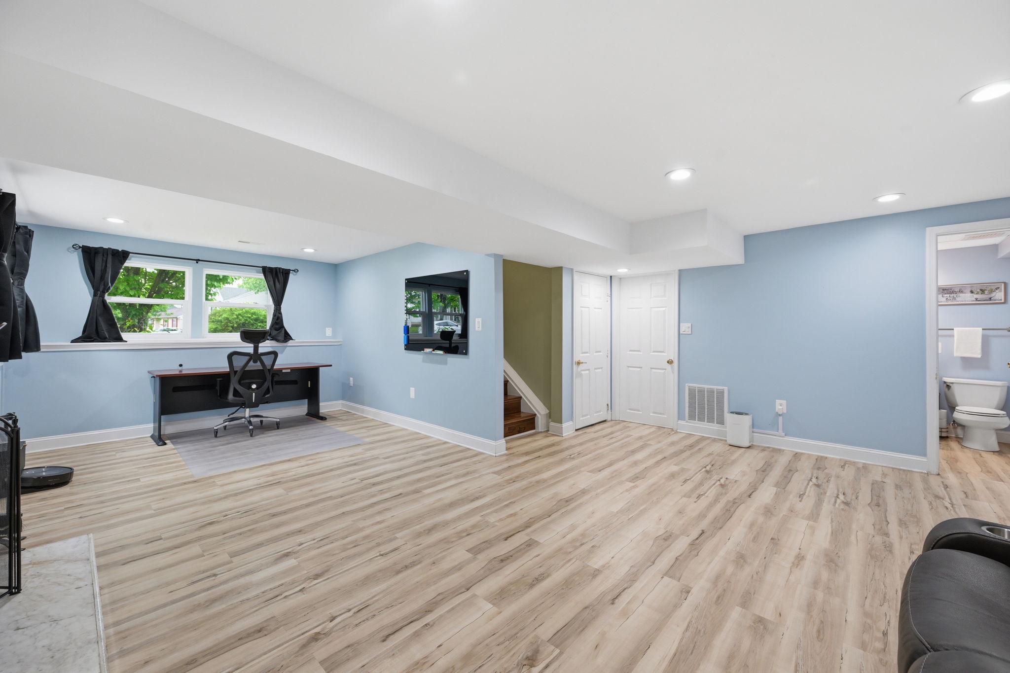 7949 Innkeeper Drive Severn, MD 21144 - Photo 35 of 51 Bright and airy basement retreat.