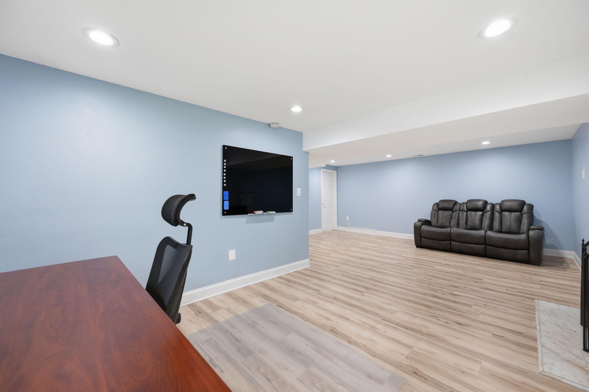 7949 Innkeeper Drive Severn, MD 21144 - Photo 38 of 51 Spacious, modern living area awaits you.