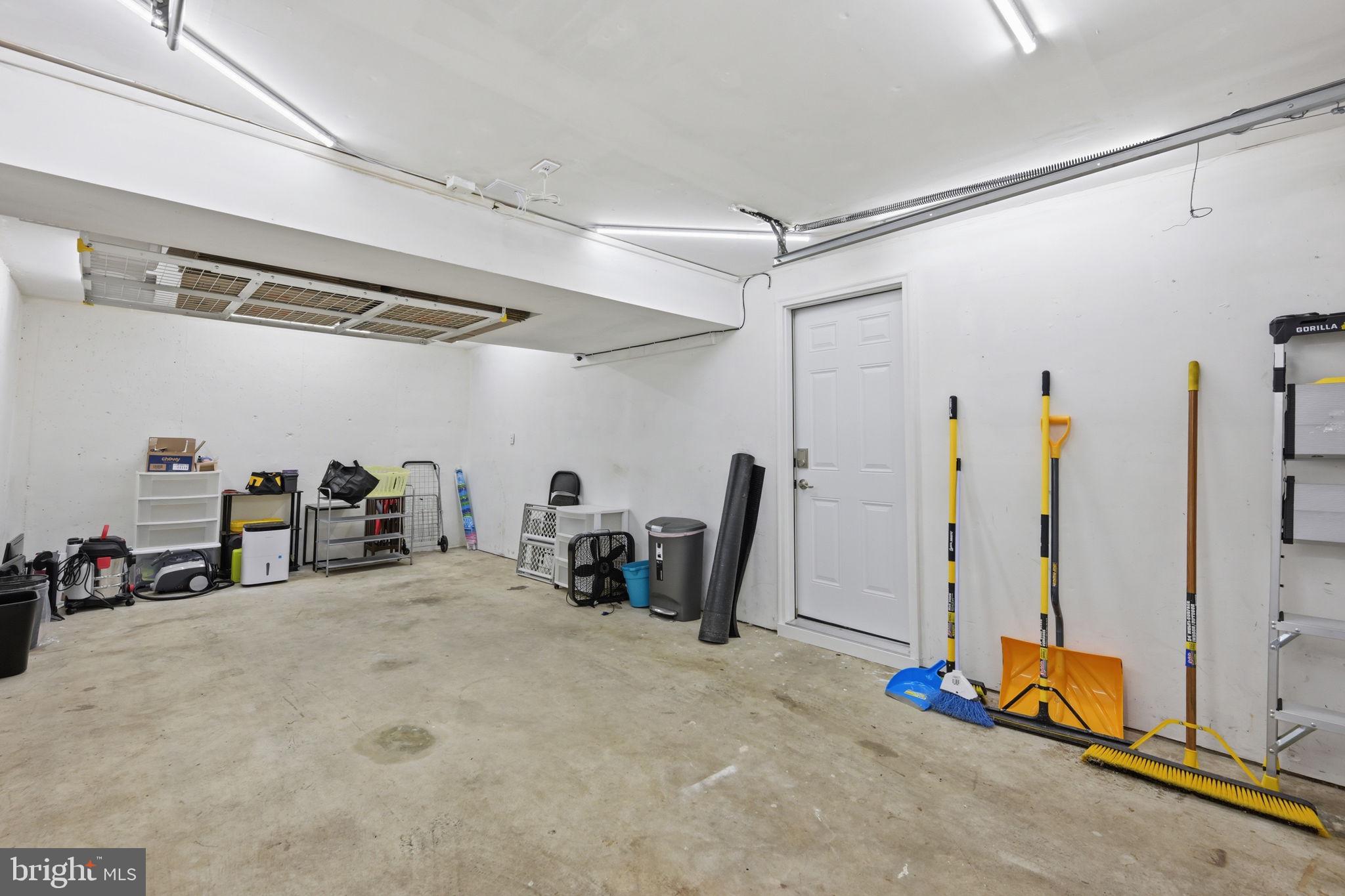 7949 Innkeeper Drive Severn, MD 21144 - Photo 45 of 51 Spacious garage with ample storage.