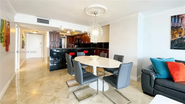 a view of a dining room with furniture