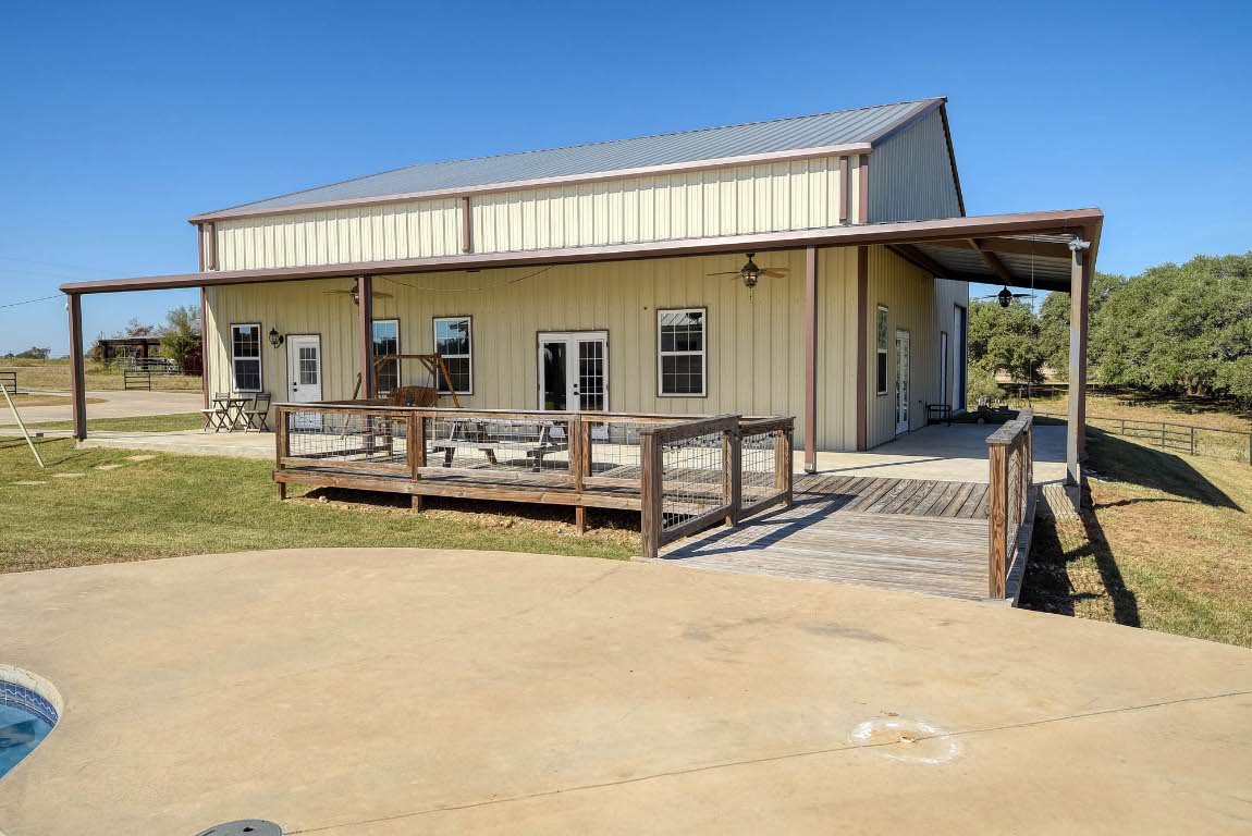 603 Watterson Road, Unit B AND C Bastrop, TX 78602 - Photo 22 of 40 a view of a house with backyard porch and furniture