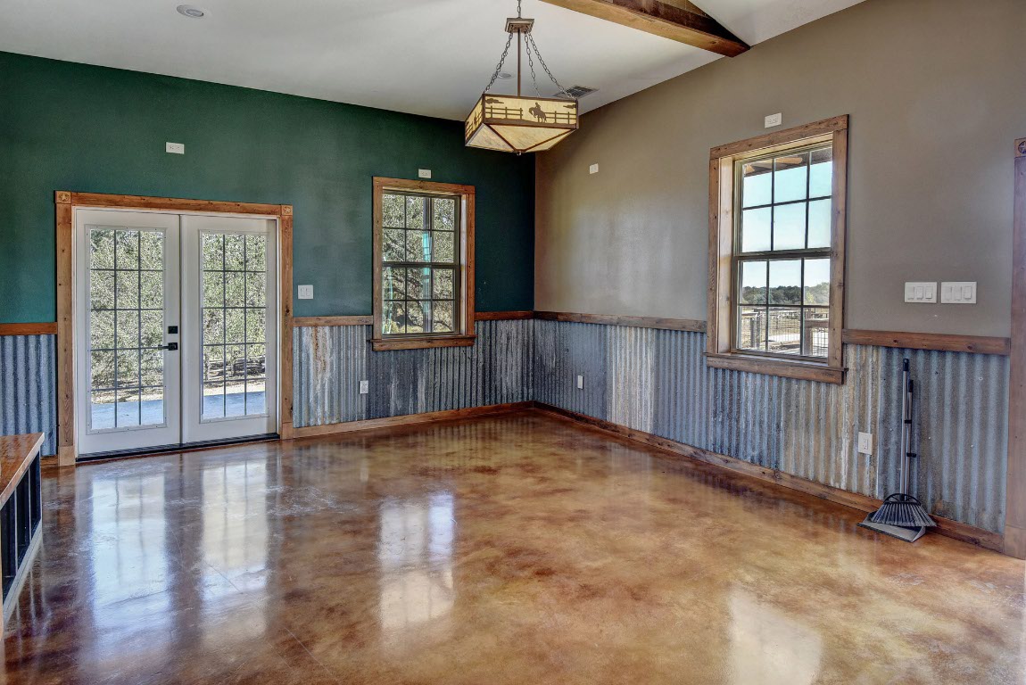 603 Watterson Road, Unit B AND C Bastrop, TX 78602 - Photo 27 of 40 a view of an empty room with wooden floor and a window