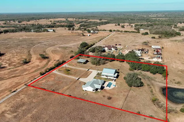 an aerial view of beach and ocean