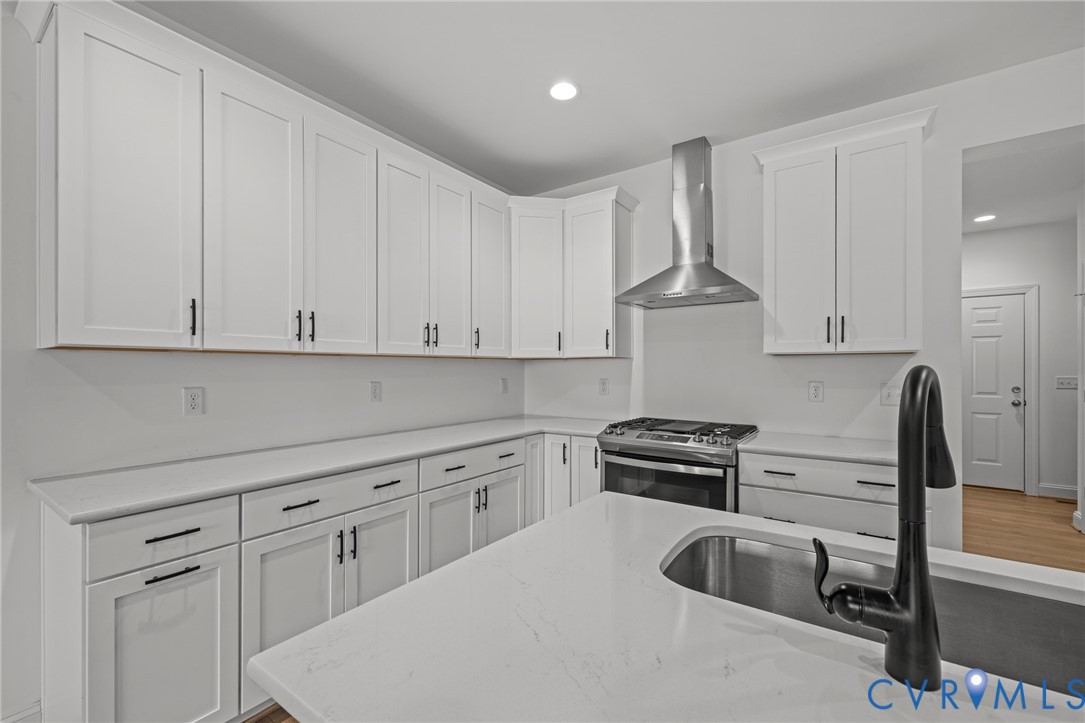 224 Lauradell Road Ashland, VA 23005 - Photo 15 of 74 Kitchen featuring white shaker-style cabinetry, li