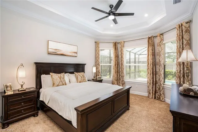 a bed room with a bed and a tv