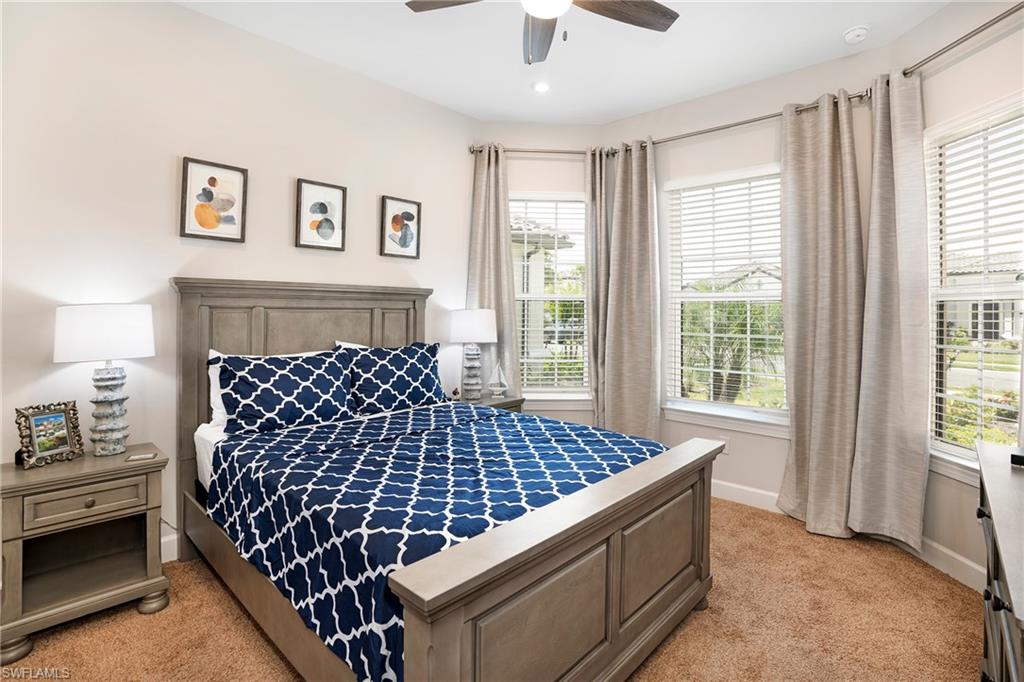 8131 Lucello Terrace North Naples, FL 34114 - Photo 19 of 32 a bedroom with bed and window