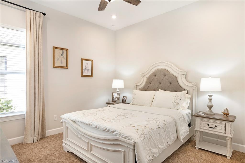 8131 Lucello Terrace North Naples, FL 34114 - Photo 21 of 32 a bedroom with a bed and a window