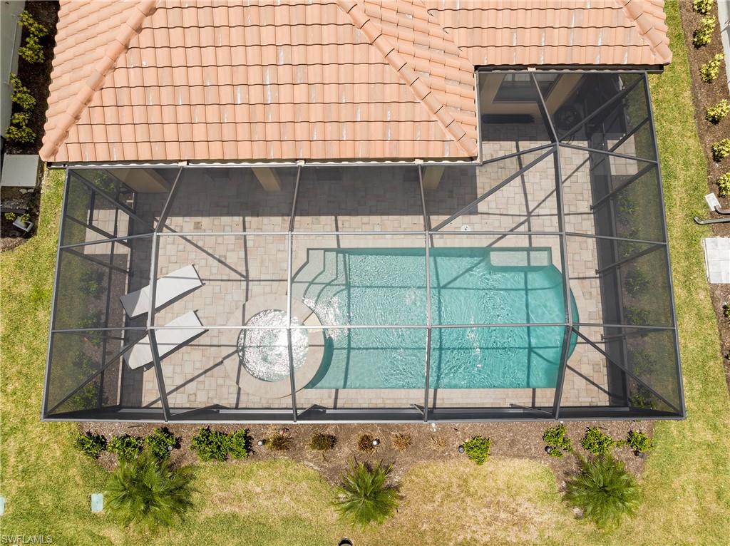 8131 Lucello Terrace North Naples, FL 34114 - Photo 26 of 32 a small pool with a outdoor space