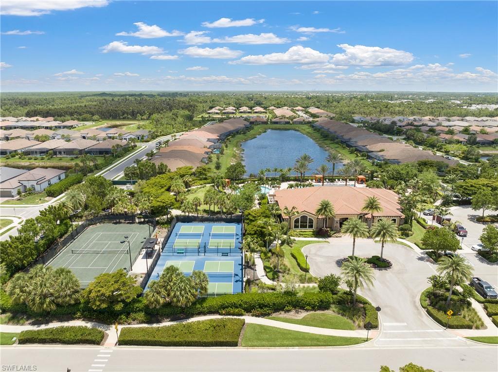 8131 Lucello Terrace North Naples, FL 34114 - Photo 27 of 32 an aerial view of residential houses with outdoor space