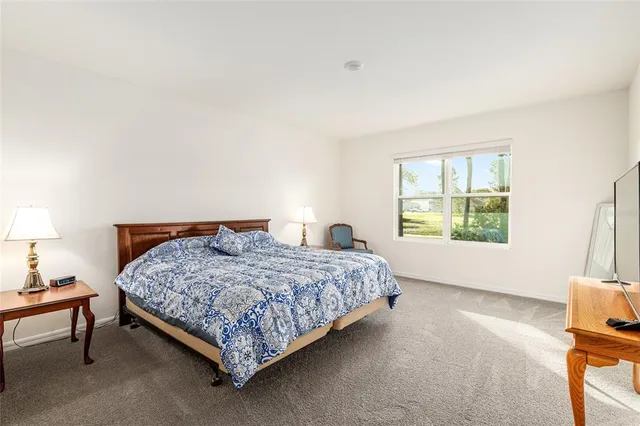 a view of a storage room with a table and chairs