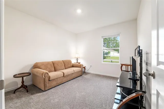 an aerial view of a house with a garden