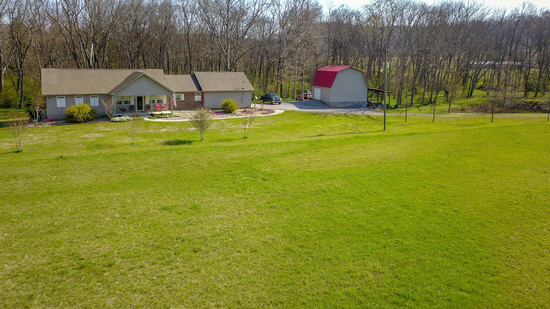 4575 Sunnyside Road Philadelphia, TN 37846 - Photo 5 of 33 a view of swimming pool with garden and trees