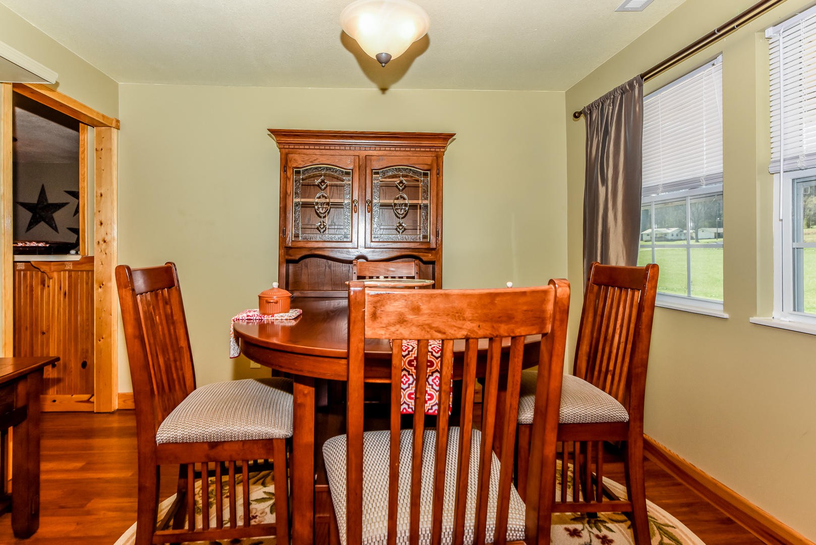 4575 Sunnyside Road Philadelphia, TN 37846 - Photo 10 of 33 a view of a dining room with furniture window and outside view