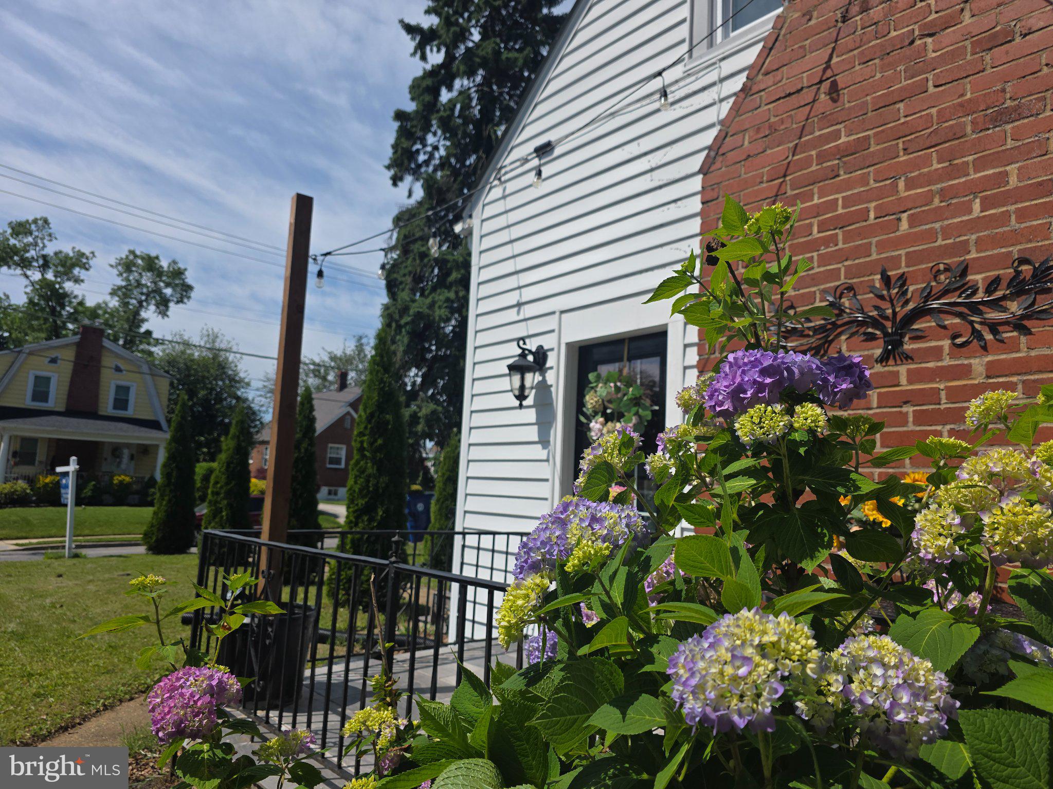 3712 West Cold Spring Lane Baltimore, MD 21215 - Photo 24 of 39 Charming home with vibrant blooms.