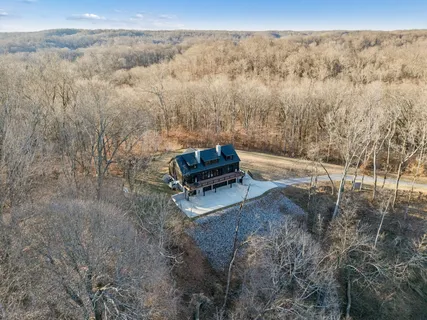 a view of a outdoor with trees in the background