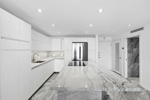 $550,000 | 1658 Bay Road, Unit 504, Miami Beach, FL 33139