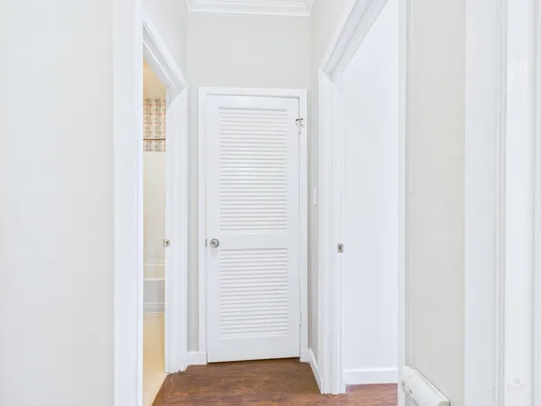 a view of a bedroom from the hallway