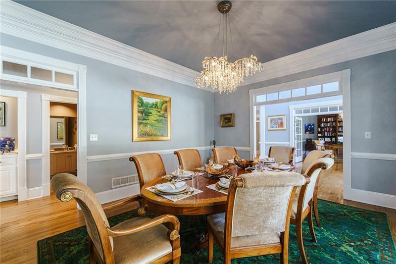 1801 Birmingham Road Milton, GA 30004 - Photo 17 of 102 a view of a dining room with furniture a chandelier and wooden floor