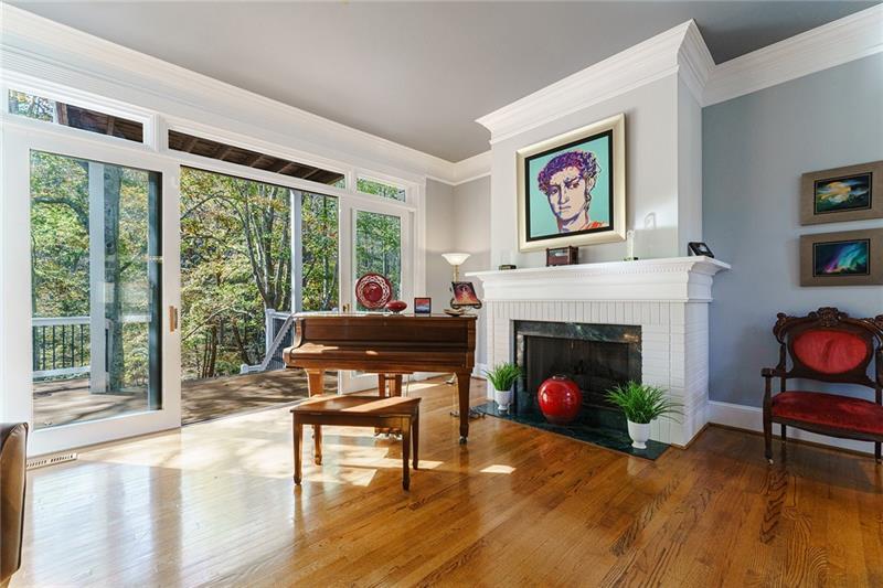 1801 Birmingham Road Milton, GA 30004 - Photo 19 of 102 a living room with furniture a fireplace and a table