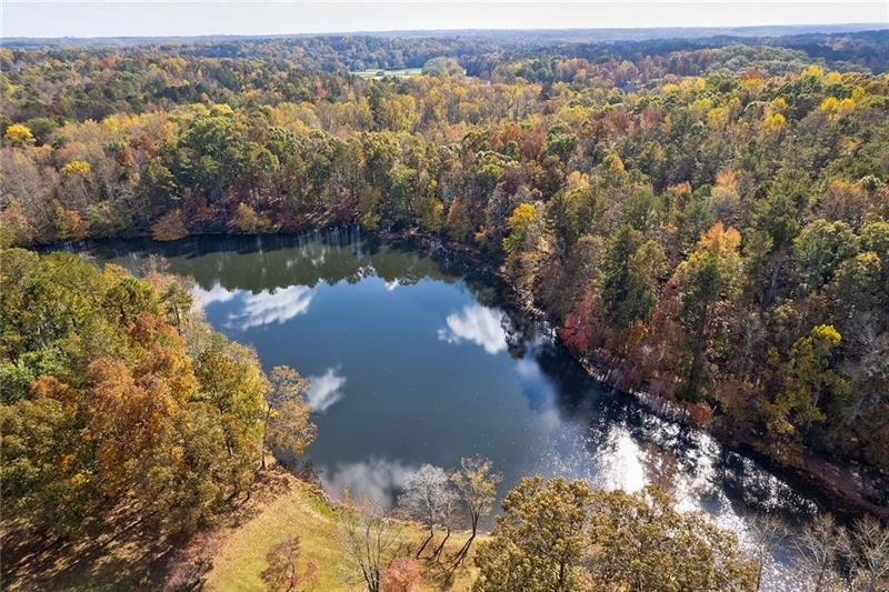 1801 Birmingham Road Milton, GA 30004 - Photo 3 of 102 a view of a lake with mountains in the background