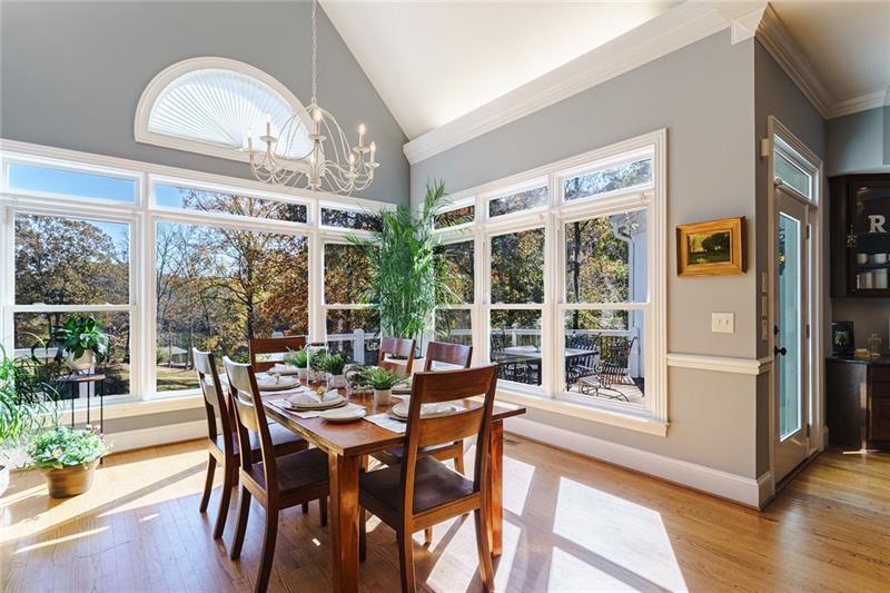 1801 Birmingham Road Milton, GA 30004 - Photo 36 of 102 a view of a dining room with furniture window and wooden floor