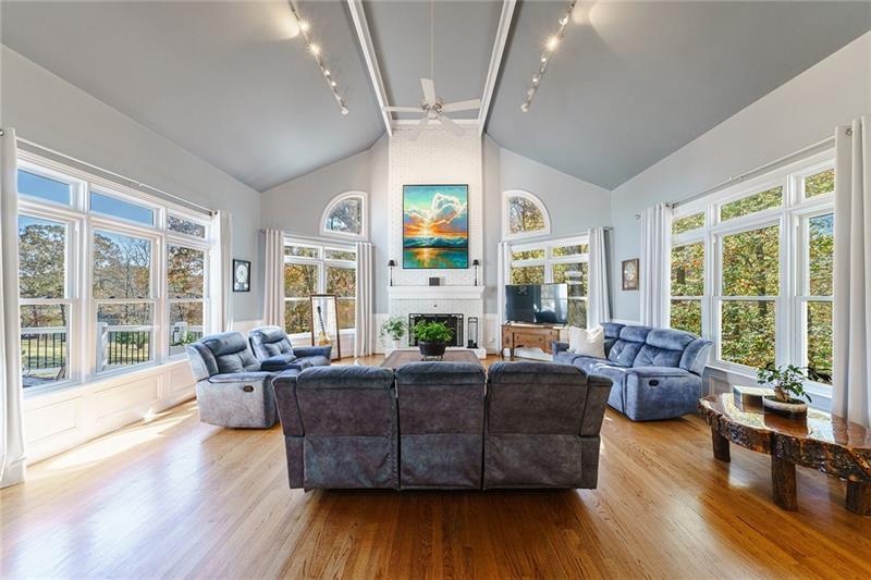 1801 Birmingham Road Milton, GA 30004 - Photo 40 of 102 a living room with furniture and large windows