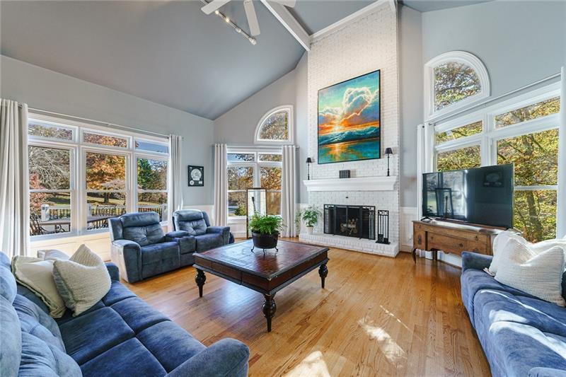 1801 Birmingham Road Milton, GA 30004 - Photo 41 of 102 a living room with furniture fireplace and flat screen tv
