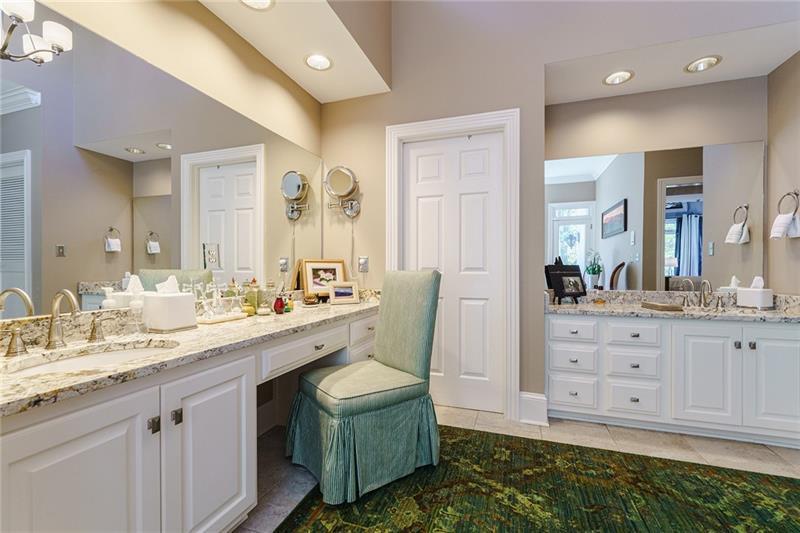 1801 Birmingham Road Milton, GA 30004 - Photo 49 of 102 a spacious bathroom with a granite countertop sink and a mirror