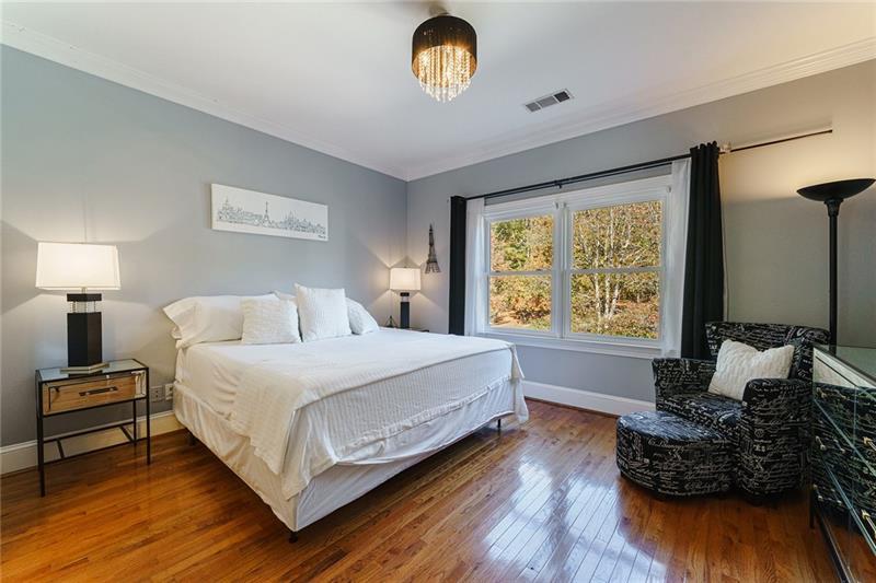 1801 Birmingham Road Milton, GA 30004 - Photo 56 of 102 a bedroom with a bed and a window