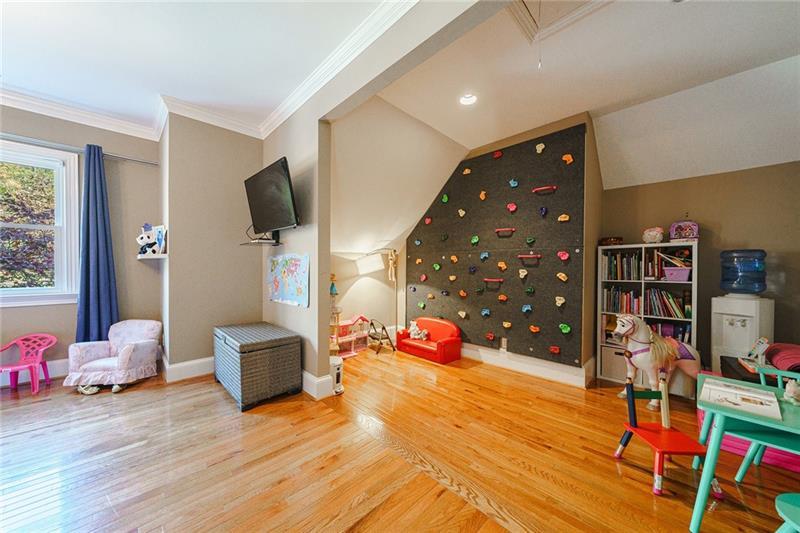 1801 Birmingham Road Milton, GA 30004 - Photo 59 of 102 a living room with furniture and a flat screen tv