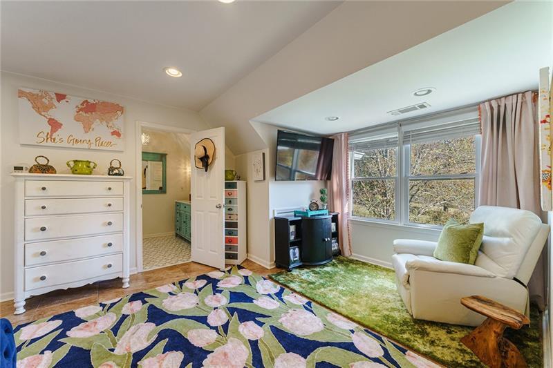 1801 Birmingham Road Milton, GA 30004 - Photo 62 of 102 a bedroom with a bed and a dresser