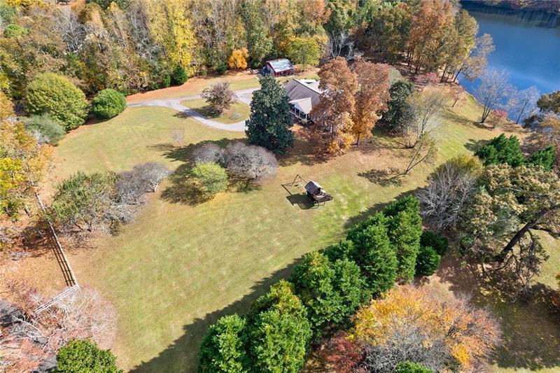 1801 Birmingham Road Milton, GA 30004 - Photo 90 of 102 a view of a yard covered with snow in outdoor space
