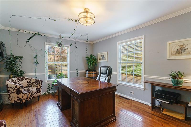 1801 Birmingham Road Milton, GA 30004 - Photo 93 of 102 a view of a workspace with furniture and a window
